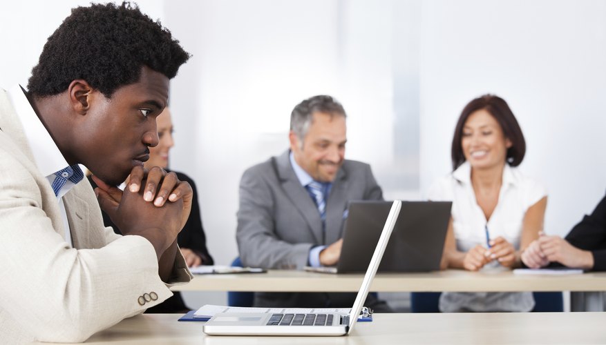 African Businessman Looking At Laptop