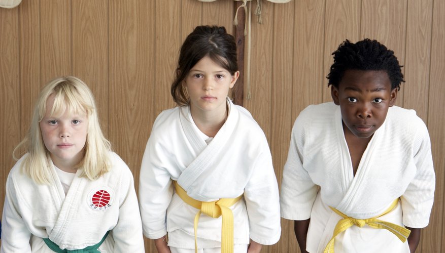 Add to your child's experience and join her karate class. Add to your child's experience and join her karate class.