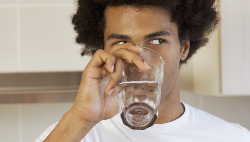 Man drinking water Man drinking water