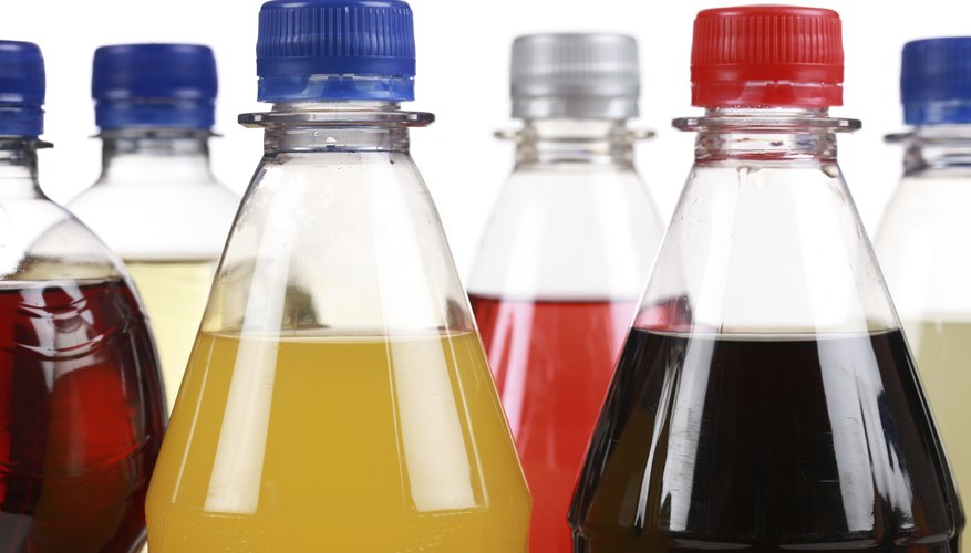 Different bottles with soda