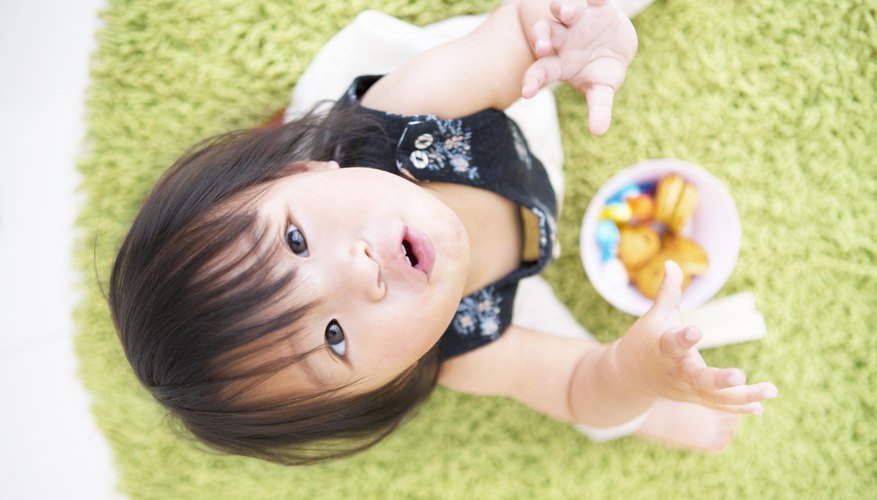 Toddler looking up at the camera. Toddler looking up at the camera.