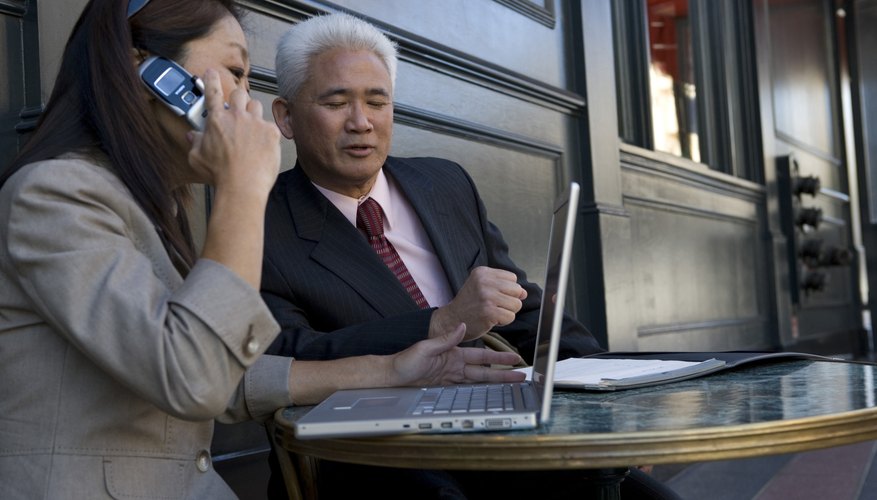 Businesswoman and businessman on business meeting