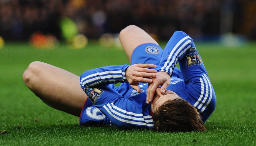 Soccer player with mouth injury Soccer player with mouth injury