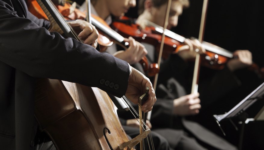 Photo Credit: stokkete/iStock/Getty Images Musicians preforming on stage