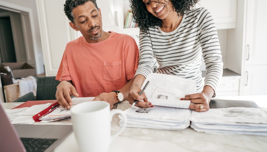 What Is the Difference Between Federal Withholding Tax & FICA?
