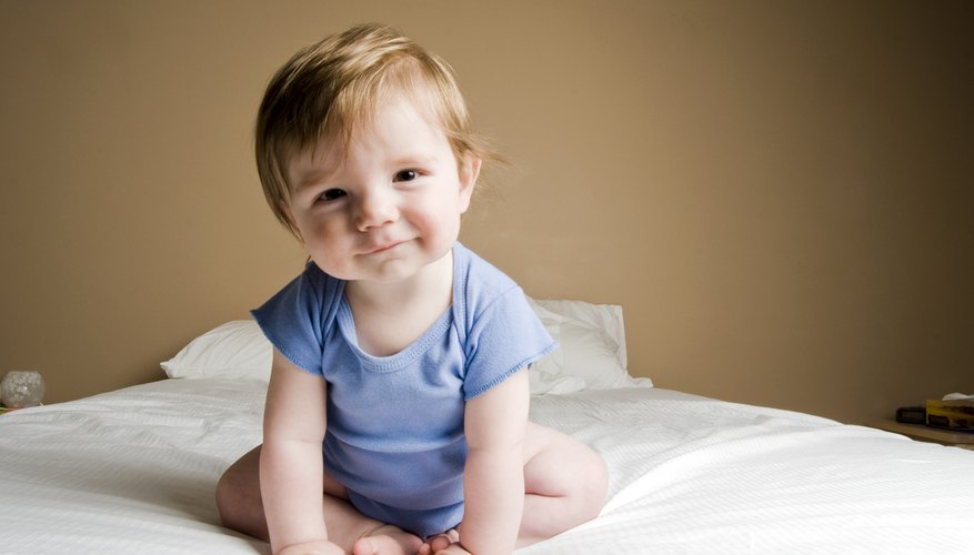 When do babies sit up mom life
