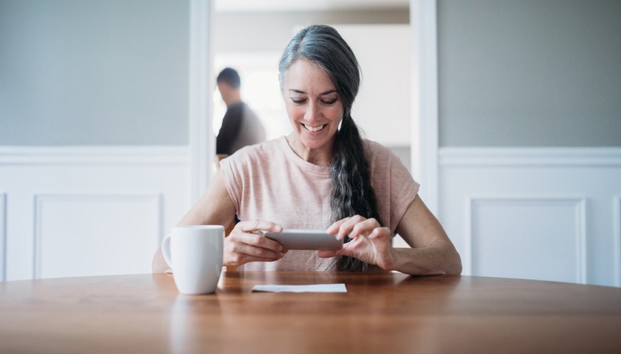 How to Reload a Pre-Paid Visa Card From a Checking Account