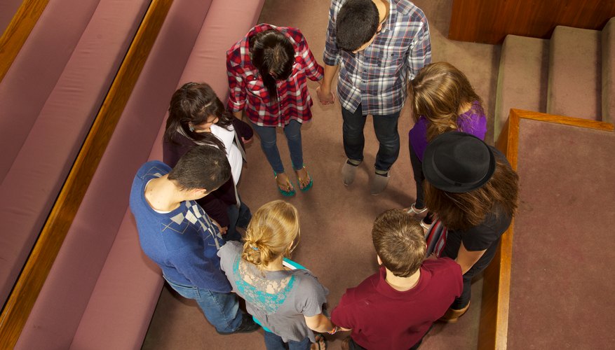 Photo Credit: pastorscott/E+/GettyImages Prayer and praise activities begin youth rallies, usually within the church chapel.