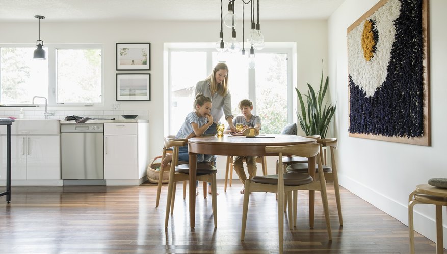 Advantages & Disadvantages of Putting a House in a Trust