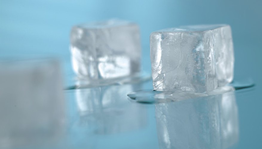 Photo Credit: Comstock/Comstock/Getty Images Ice cubes can be part of an experiment involving thermal dynamics.