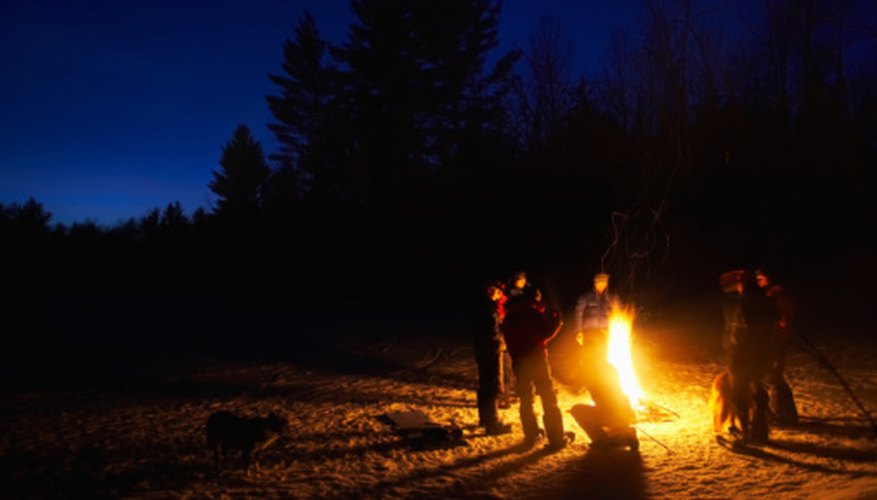 Photo Credit: Jupiterimages/Photos.com/Getty Images The burn rate of different types of wood can make for an interesting science project.