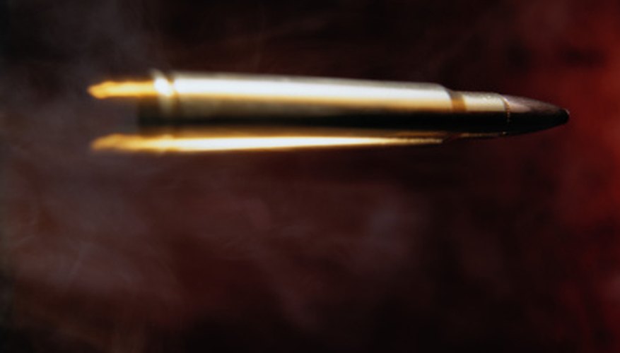 Photo Credit: Photodisc/Photodisc/Getty Images A bullet suddenly gains momentum as it is fired.
