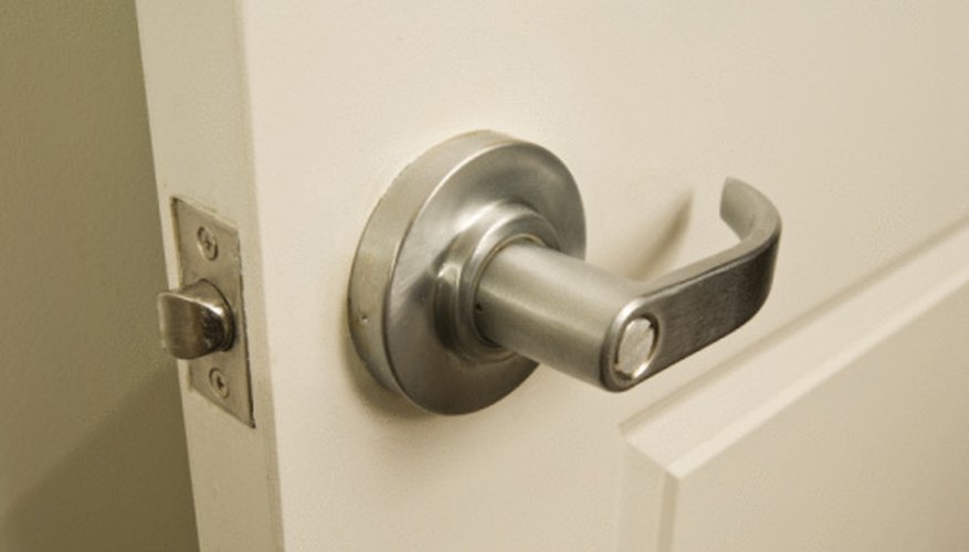 Photo Credit: Jupiterimages/Photos.com/Getty Images Push a door at an angle, and less force will turn it.