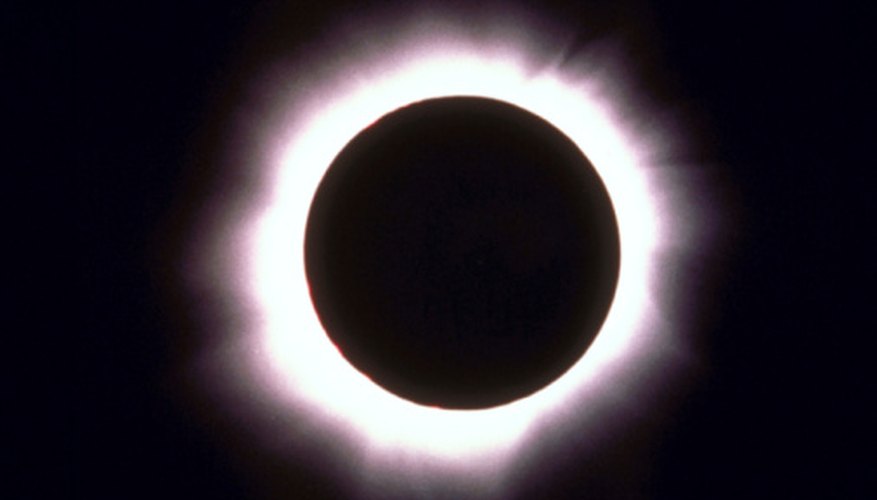 Photo Credit: Ablestock.com/AbleStock.com/Getty Images The sun's photosphere, or bright center, is blocked during a solar eclipse.