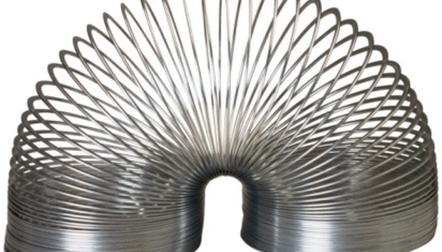 Photo Credit: Ablestock.com/AbleStock.com/Getty Images Explore physics with Slinkies.