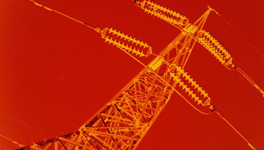 Photo Credit: Stockbyte/Stockbyte/Getty Images A transfomer converts high voltage to low voltage, suitable to power battery devices.