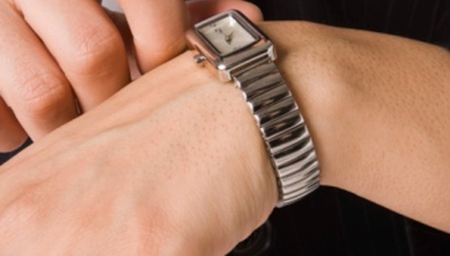 Photo Credit: Jupiterimages/Polka Dot/Getty Images Electromagnetic fields can stop your watch from working correctly.