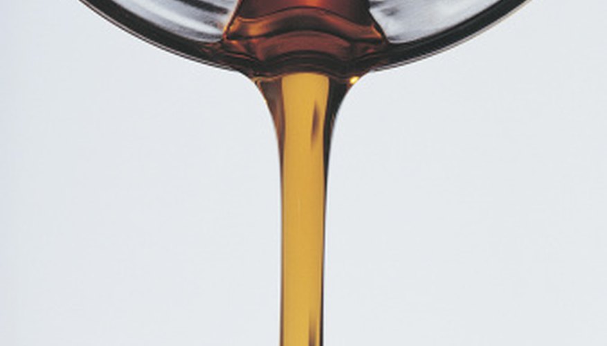 Photo Credit: Comstock/Comstock/Getty Images A Zahn cup can also measure oil viscosity.
