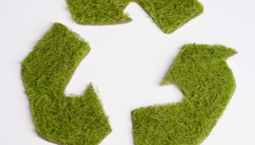 Photo Credit: Jupiterimages/Comstock/Getty Images Recycling helps to reduce energy consumption.
