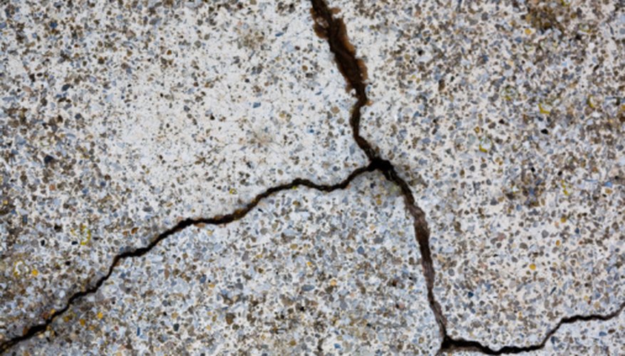 Photo Credit: Jupiterimages/Photos.com/Getty Images Weathering gradually breaks down rocks.