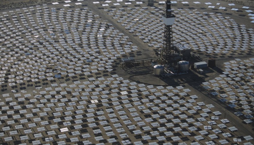 Photo Credit: Tom Brakefield/Stockbyte/Getty Images This field of mirrors concentrates solar energy on a tank, heating the liquid to drive a turbine.