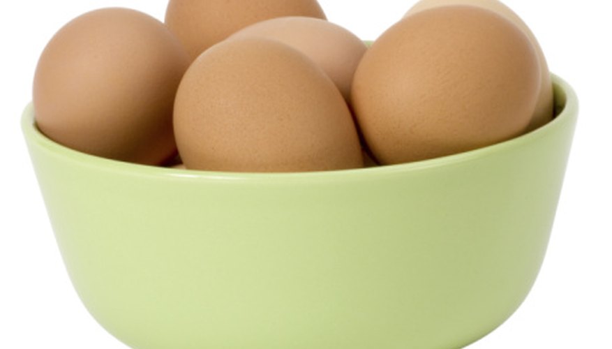 Photo Credit: Photos.com/PhotoObjects.net/Getty Images Raw eggs, when lowered gently into salt water, will float.