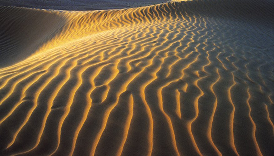 Photo Credit: Digital Vision./Photodisc/Getty Images Desert terrain can range from sandy to icy.