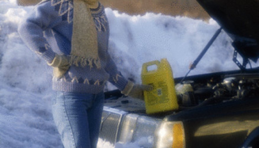 Photo Credit: Jupiterimages/Photos.com/Getty Images Essential for automobiles, antifreeze is also hazardous to plants, animals and the environment.