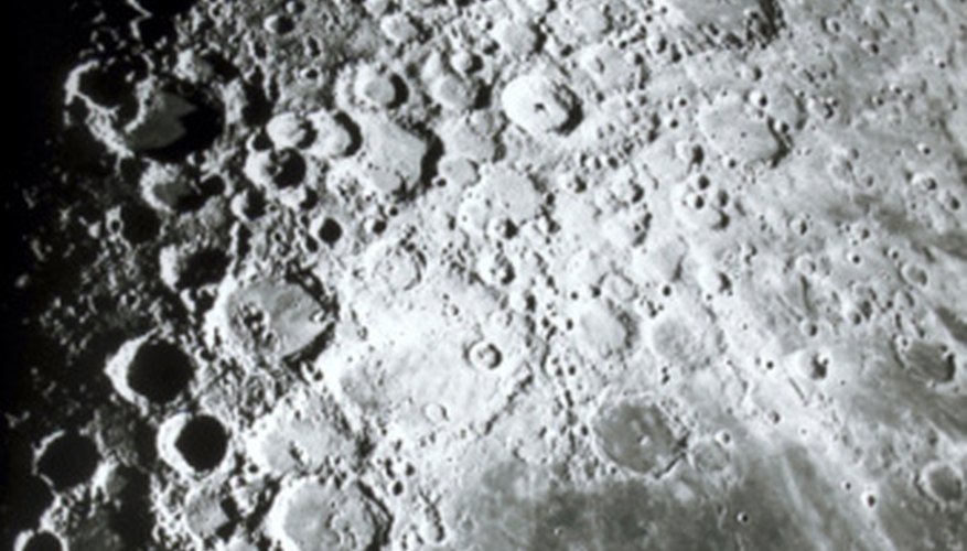 Photo Credit: Hemera Technologies/AbleStock.com/Getty Images The surface of the moon is covered in craters left by meteorites.