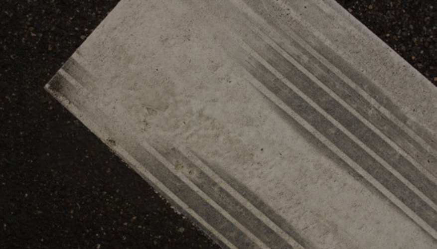 Photo Credit: Jupiterimages/Photos.com/Getty Images Skid marks are measured to determine rate of speed.