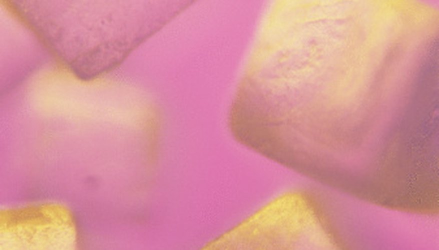 Photo Credit: Jupiterimages/Photos.com/Getty Images Speed up the formation of your science fair crystals.