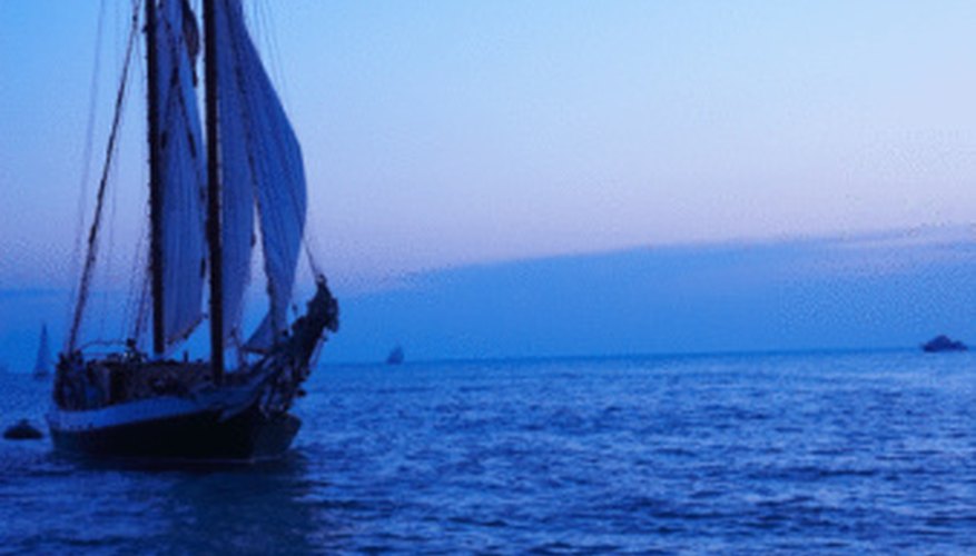 Photo Credit: Jupiterimages/Photos.com/Getty Images Wind speeds are given in knots for sailing activities.
