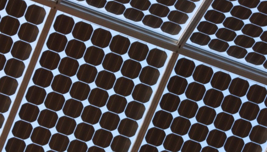 Photo Credit: Hemera Technologies/AbleStock.com/Getty Images Photovoltaic panels are made from semiconductors that convert light directly into electricity.