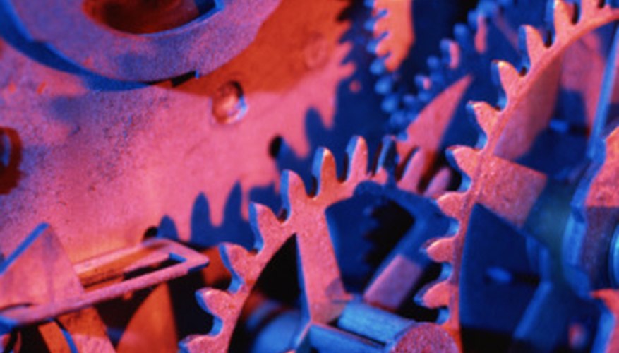 Photo Credit: Jupiterimages/Photos.com/Getty Images Gears' pitch and tooth sizes define their interaction with other gears.