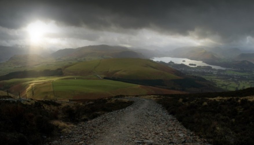 Photo Credit: Jupiterimages/Photos.com/Getty Images Hills and mountains capture precipitation and affect the local climate.