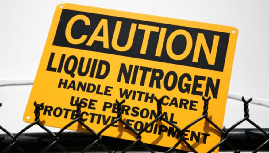 Photo Credit: Jupiterimages/Photos.com/Getty Images You should use caution and wear personal protective equipment around liquid nitrogen.