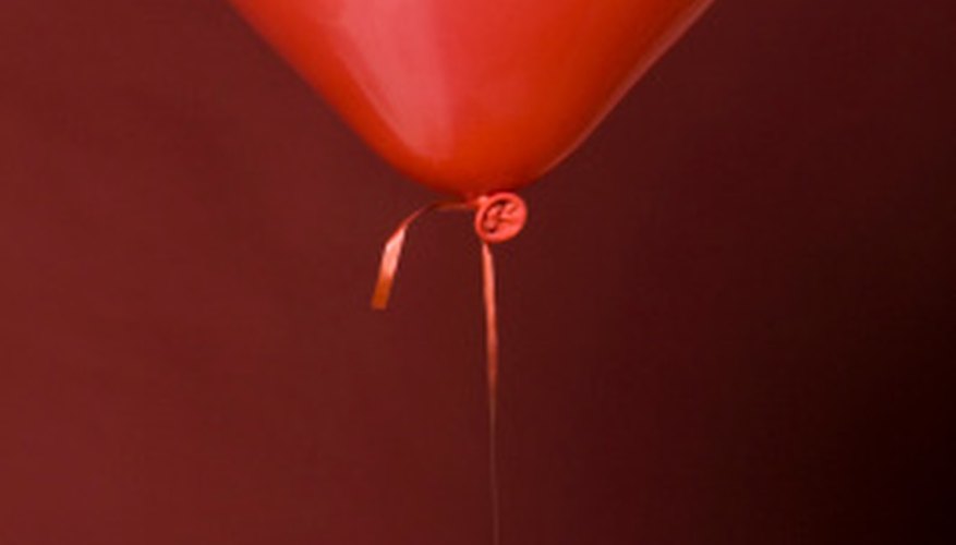 Photo Credit: Dynamic Graphics/Creatas/Getty Images Helium balloons float because they are much lighter than air.