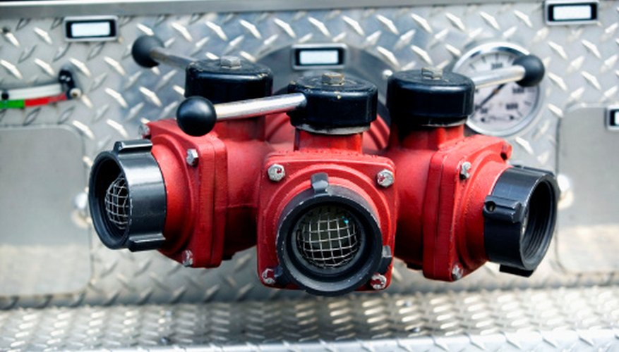 Photo Credit: Jupiterimages/liquidlibrary/Getty Images The ball valves on this fire truck are used to turn water flow off and on.