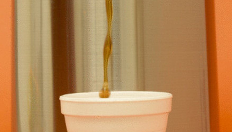 Photo Credit: Jupiterimages/Photos.com/Getty Images Styrofoam cups are made from insulating material.