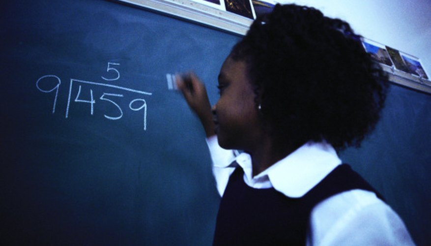 Photo Credit: Stockbyte/Stockbyte/Getty Images A division bracket separates the divisor, dividend and quotient in a division problem.