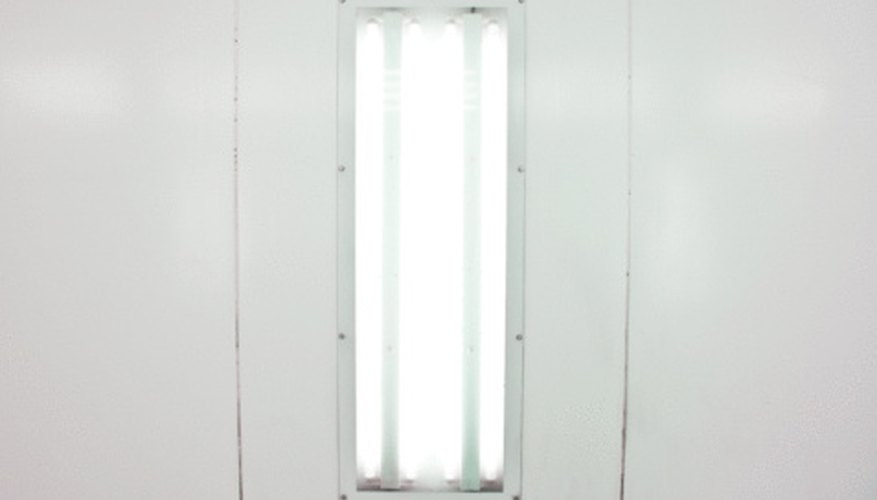 Photo Credit: Jupiterimages/Photos.com/Getty Images Fluorescent lights give off a harsh light that bothers some people.