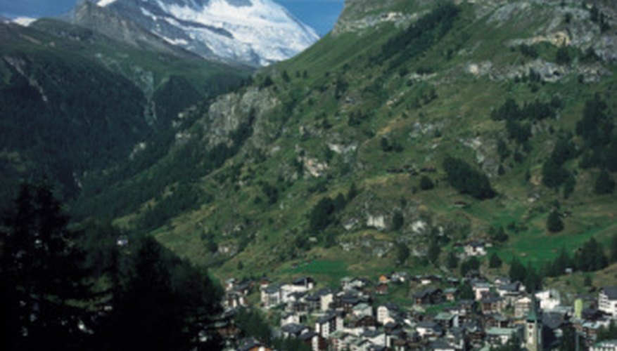 Photo Credit: Ablestock.com/AbleStock.com/Getty Images Towns nestled deep in valleys are often under mountain shadows.