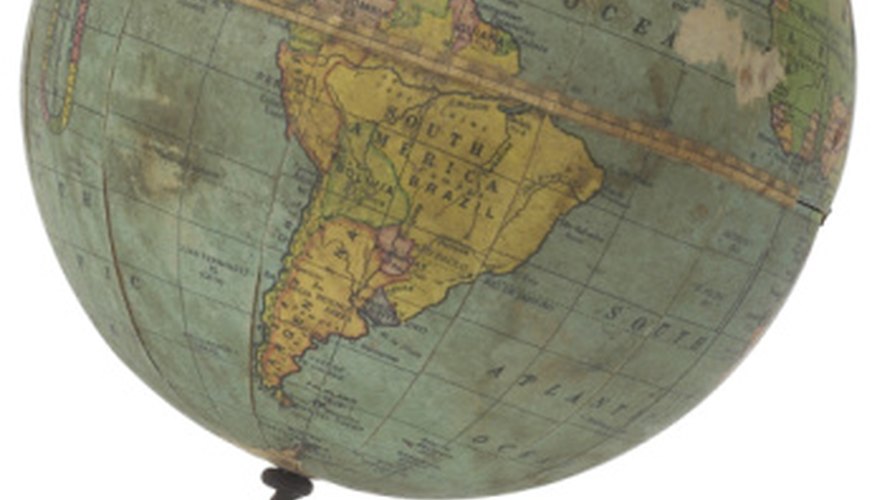 Photo Credit: Hemera Technologies/PhotoObjects.net/Getty Images Globes illustrate the rotational axis of the Earth as well as the continents.