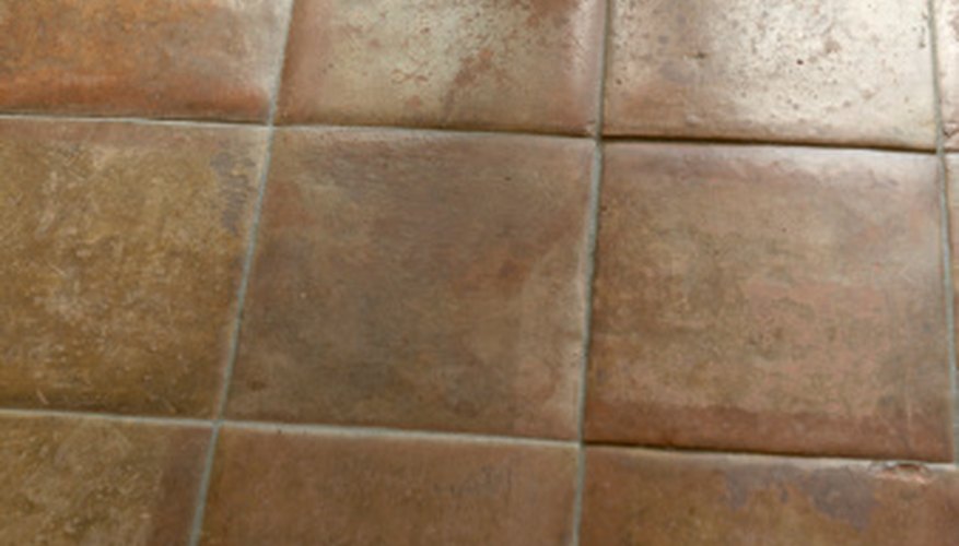 Photo Credit: ULTRA F/Photodisc/Getty Images You'll need 480 6-inch tiles to cover a room measuring 10 feet by 12 feet.