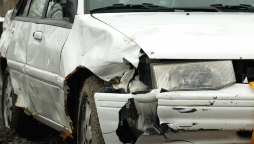Photo Credit: Jupiterimages/Photos.com/Getty Images The amount of crush a car suffers in a wreck can be used to calculate its speed