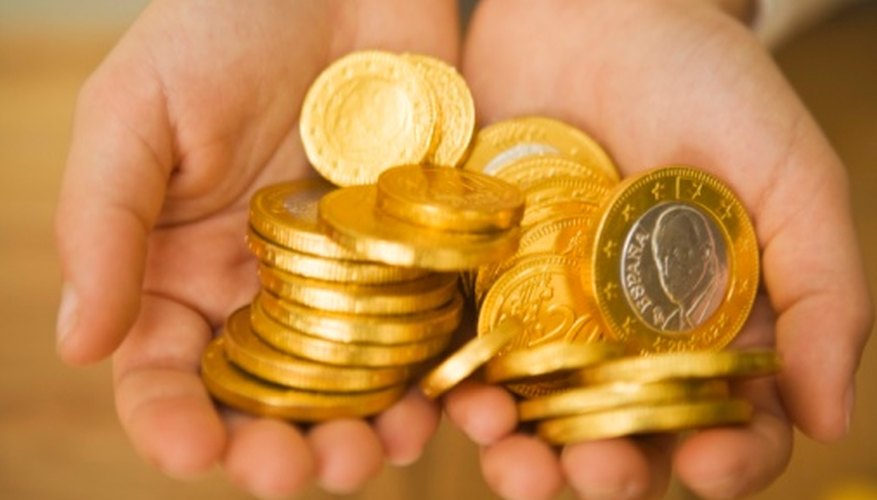 Photo Credit: Jupiterimages/BananaStock/Getty Images Pure gold is smelted from gold ore.
