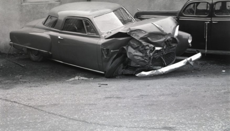 Photo Credit: George Marks/Retrofile/Getty Images Cars move together after they collide.