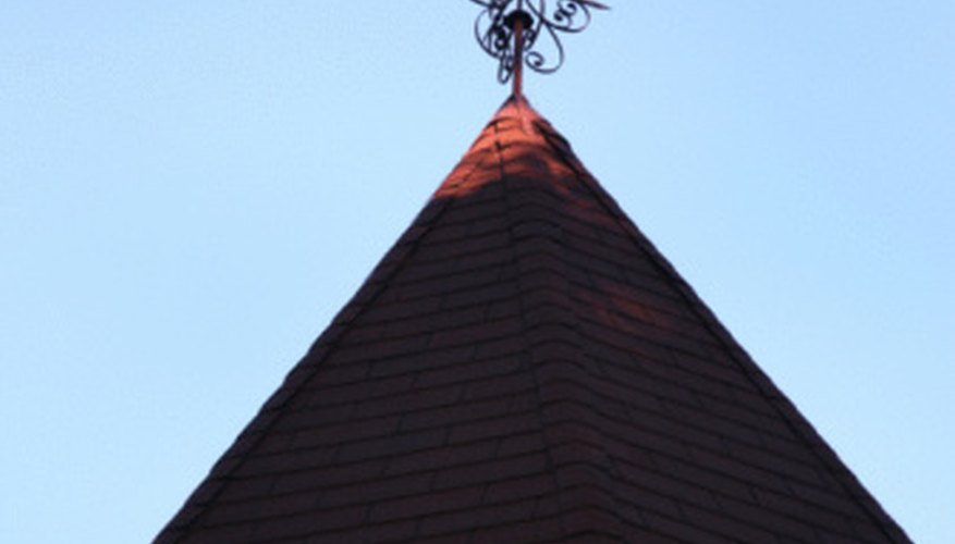 Photo Credit: Jupiterimages/Photos.com/Getty Images Surveyors can use Pythagorean theorem and trigonometric functions to find the height of a tower.
