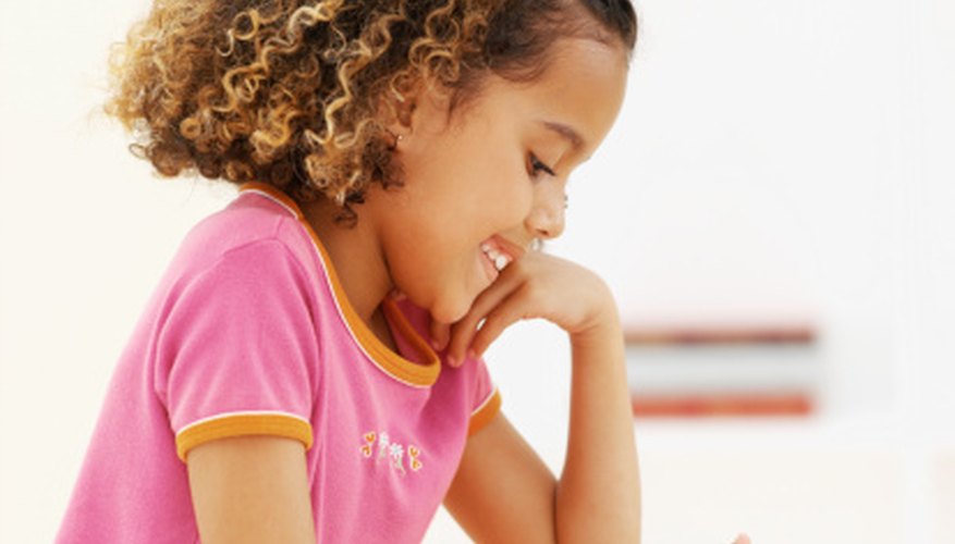 Photo Credit: Stockbyte/Stockbyte/Getty Images Fourth-grade students learn decimals using shaded graphs.