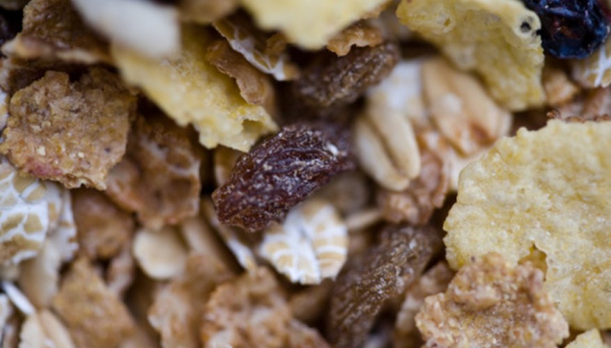 Photo Credit: Jupiterimages/Photos.com/Getty Images Granola is a mixture because you could physically separate its parts. It is also a mixture because the parts are not present in fixed ratios.